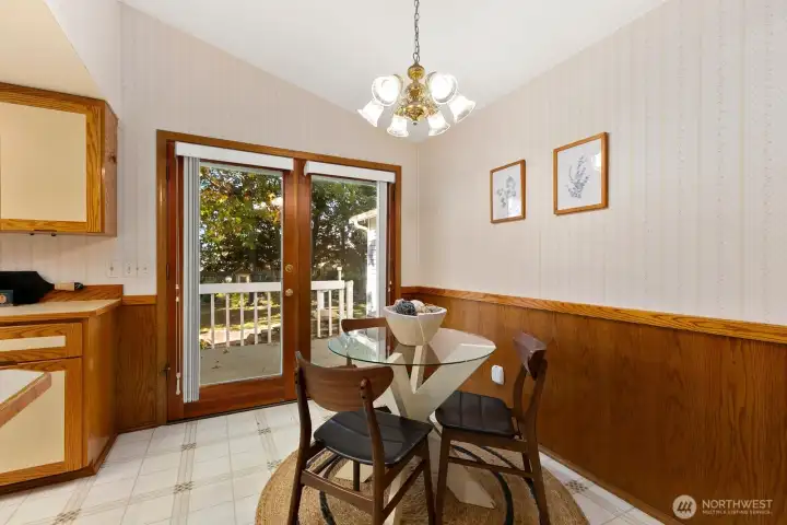 French doors lead out to deck, amazing yard and HUGE shop.