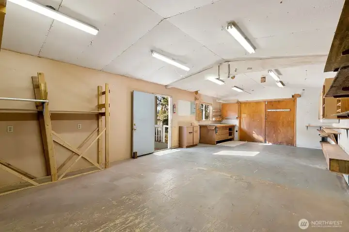 Incredible detached shop offers 220 amp power!