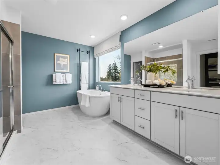 Primary bathroom with dual sinks, soaking tub, shower, and separate toilet room.  Picture for representational purposes only, colors and features may vary.
