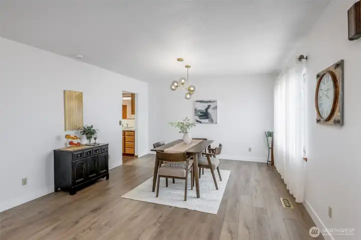 Formal dining offers additional space for larger tables if necessary.