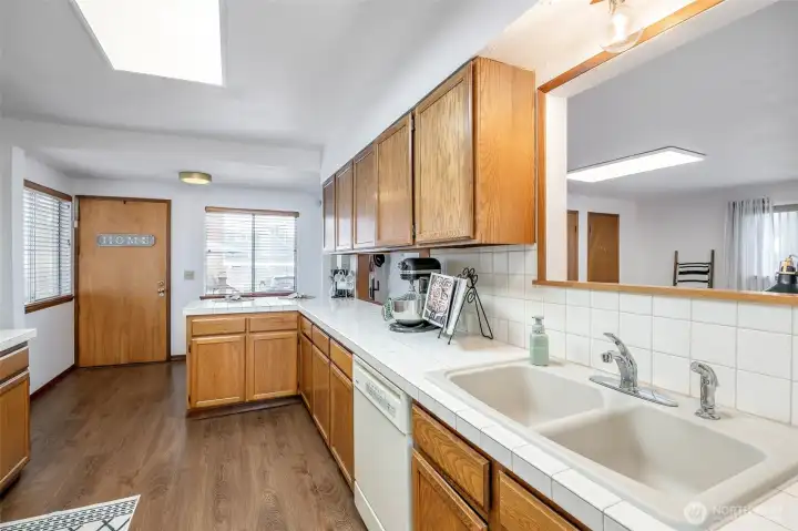 Kitchen immediately accessible from dining room
