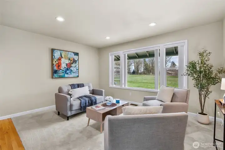 Large east facing windows offer complete views of pastures