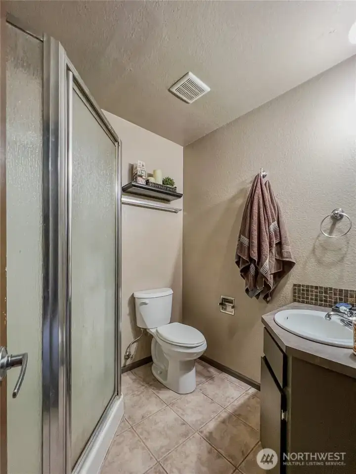 3/4 bath off of family room.