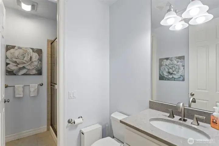 Main floor powder room with shower