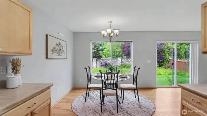 The kitchen flows seamlessly into the dining room and living room.