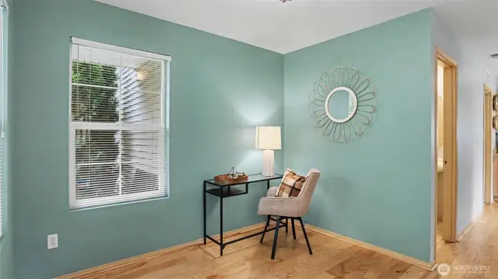 Flexible space ideal for an office, hobbies, or additional dining area.
