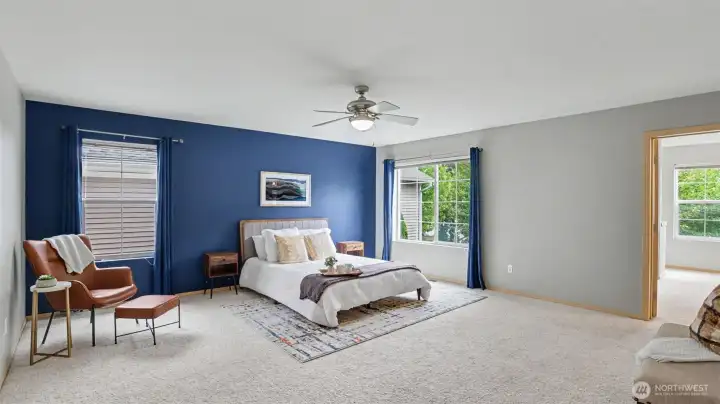 Retreat to your spacious primary bedroom with an en-suite 5-piece bath and walk-in closet.