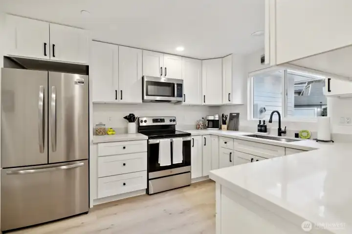 Beautifully updated kitchen with quartz countertops Beautifully updated kitchen with quartz countertops