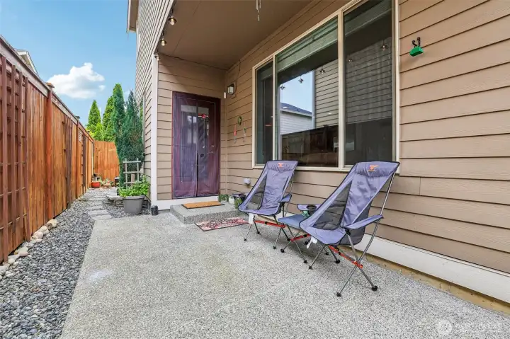 Back patio covered and fenced Back patio covered and fenced