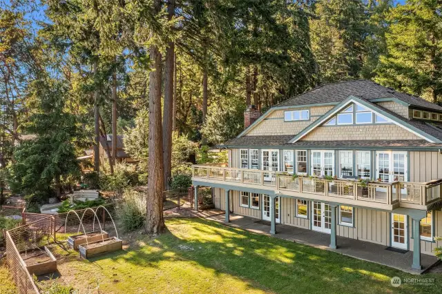 The home faces south with perfectly framed views of the sound, ferries, Tacoma and Mount Rainier. Gracious lawn has irrigation.