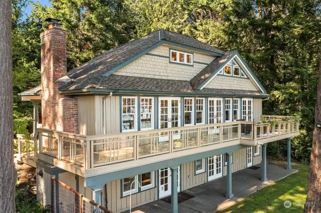 Note the generous deck to enjoy outdoor dining and entertaining.