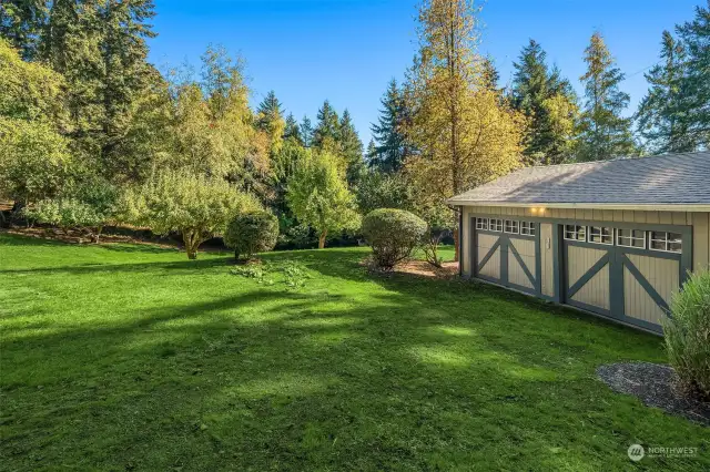 Two-car detached garage is nicely sited on the property.