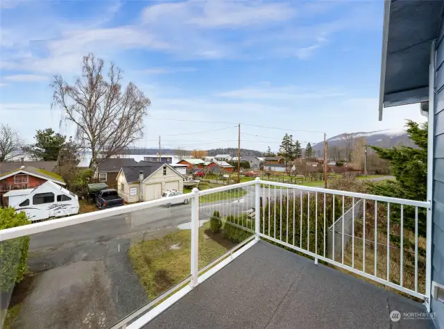 Step out onto the private balcony and take in stunning views of the surrounding neighborhood and nearby water. A serene spot to enjoy morning coffee or sunsets.