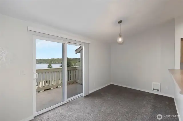 Dining Area/Slider to Balcony & Storage