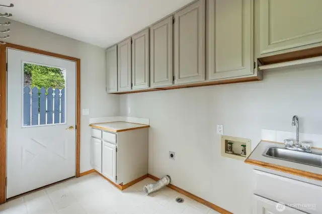 Utility room with tons of cabinets!