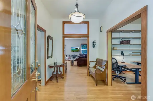The grand foyer to greet your guests, with easy access to your private office.