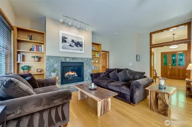 The grand living room, complete with bookshelves to display the path of your life.  A comfortable entertainment area for yourself or with your guests.