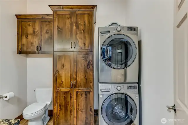 1/2 bath off the kitchen with Washer Dryer that isn't keeping you awake at the sleeping end of the house.