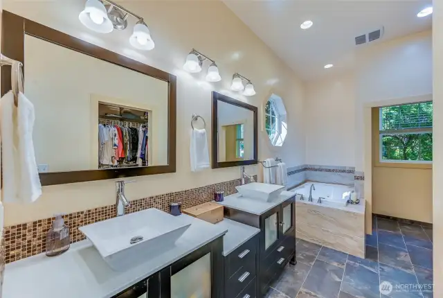 Two sinks?  Two happy people! Never have to wait to brush your teeth AND great conversational space between the sink and tub!