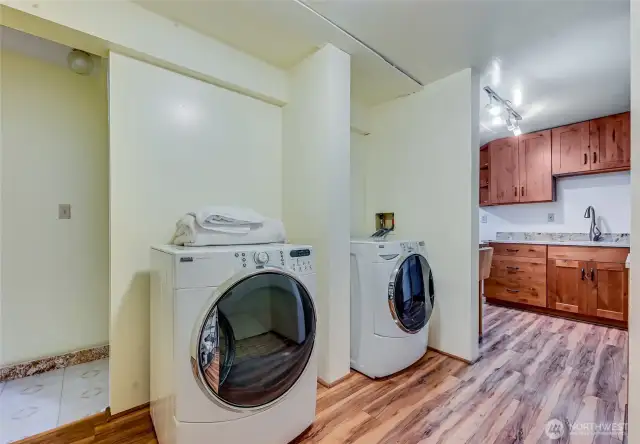 Utility and storage area, complete with your own washer and dryer!  No stairs for your laundry!