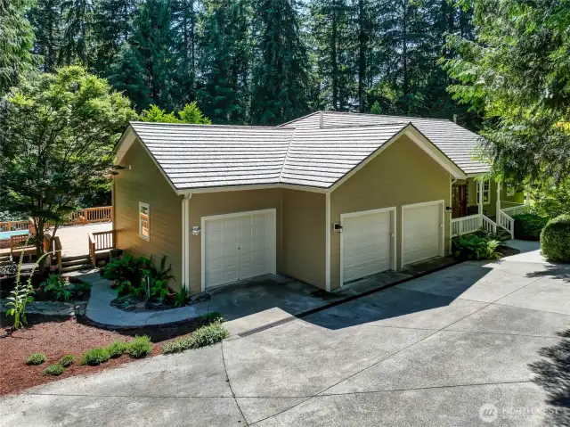 Oversized parking and circular driveway, with ample room for several cars.  Easy access to the back yard, too!
