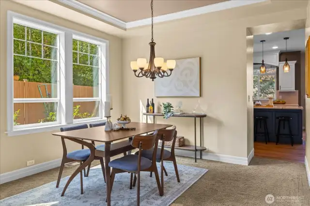 Another view of the dining room with the kitchen beyond ...