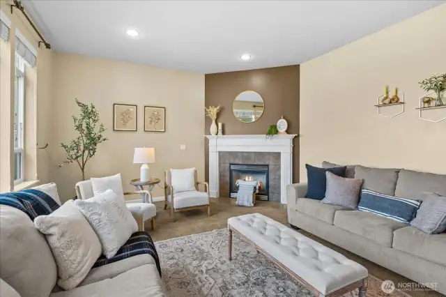 Large family room with corner gas fireplace for those cold PNW nights!