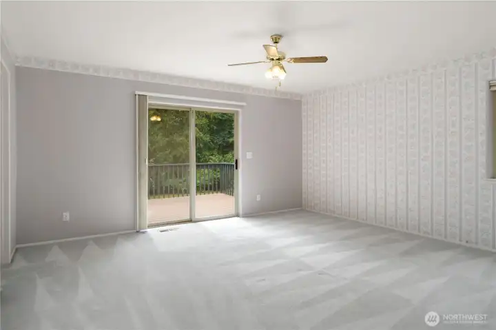 Primary Bedroom with slider door to the deck.