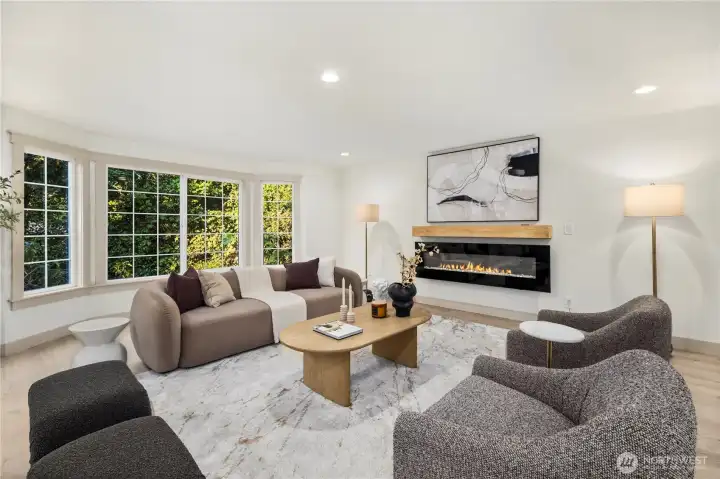 Large family room of the entry with ample space for a sectional and large TV