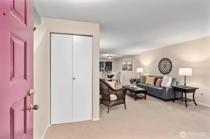 The main level features an open floor plan offering a kitchen with stainless steel appliances & breakfast bar, dining area/flex room, living room with cozy wood-burning fireplace, and ½ bathroom.