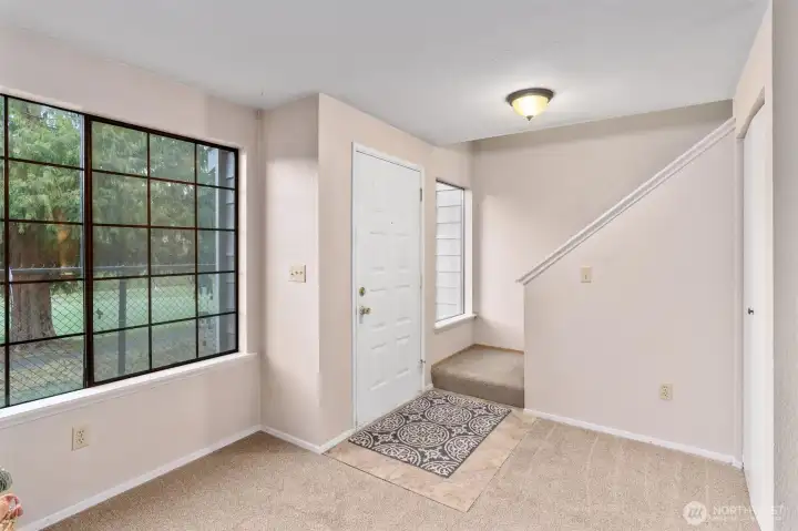 Upstairs offers a huge primary ensuite bedroom, dual closets and sinks, and a 2nd bedroom with attached full bathroom & private deck – both with vaulted ceilings.