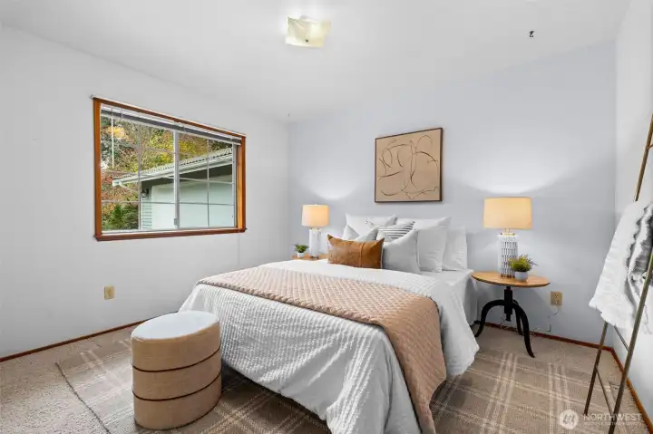 With its straightforward layout, this bedroom encourages your creativity, allowing you to make the space truly your own.