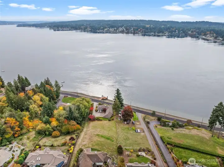 With nearby waters, the home enjoys crisp, refreshing air that enhances every season.