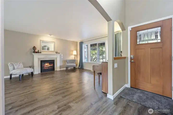 Newer LVP flooring throughout. Welcoming soaring entyrway.