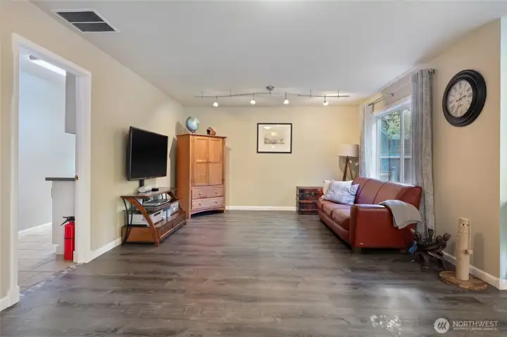 Second living area. Laundry space is through the doorway on the left.