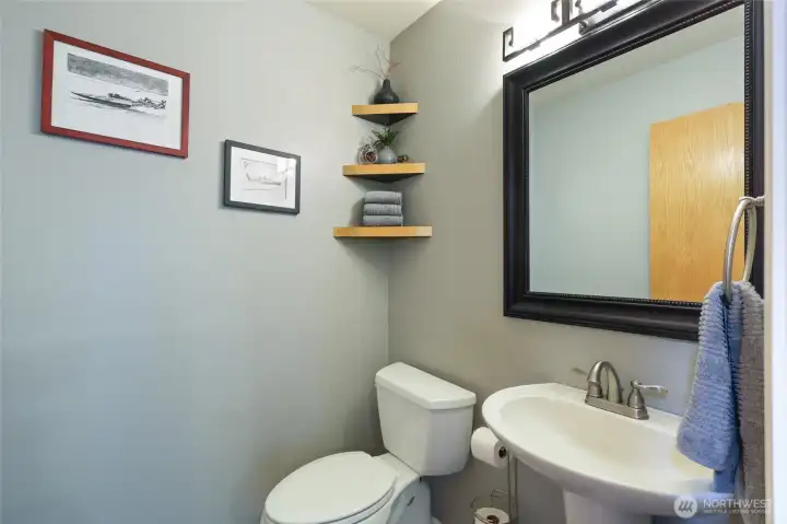 1/2 bath just off second living area on main floor.