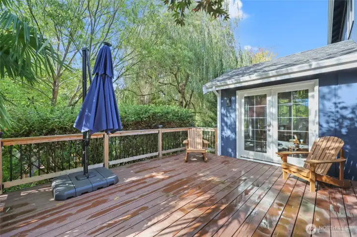Deck with nice railing off of breakfast nook and kitchen area. Imagine sipping morning coffee here or enjoying meals in the warmer months.