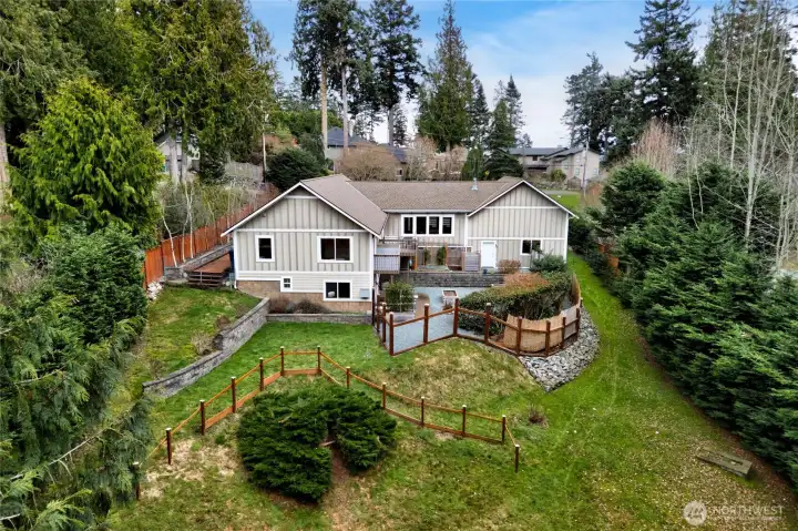 Large .42 acre yard.   Note: Large bush is removed in back yard by fence