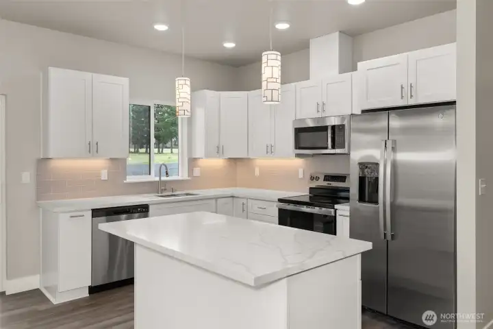 Images shown are from a different home previously constructed by this builder and are provided as examples of workmanship, finish quality, and design style only. The subject property is currently under construction, and specific materials, colors, fixtures, and features may differ upon completion.