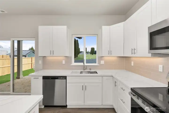 Images shown are from a different home previously constructed by this builder and are provided as examples of workmanship, finish quality, and design style only. The subject property is currently under construction, and specific materials, colors, fixtures, and features may differ upon completion.