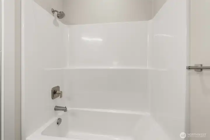 Images shown are from a different home previously constructed by this builder and are provided as examples of workmanship, finish quality, and design style only. The subject property is currently under construction, and specific materials, colors, fixtures, and features may differ upon completion.