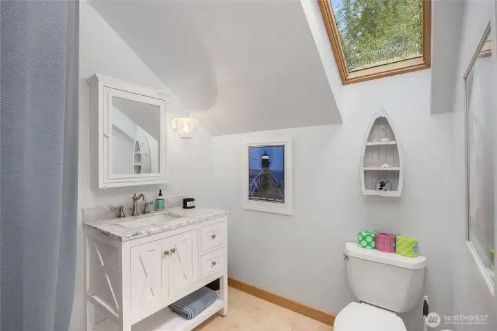 3/4 bath adjoins the upper level bedroom