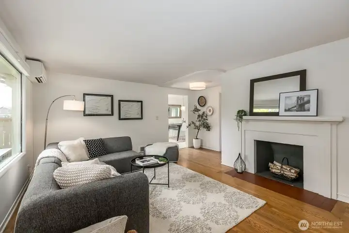 Another angle of the main living area...  The doorway you can see leads to the dining area.  The fireplace was deactivated so not working right now but might be able to be restored?