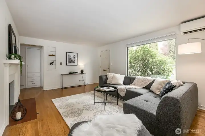 Looking this way shows the hallway to two of the bedrooms and bathroom.  Notice the built-in hall closet