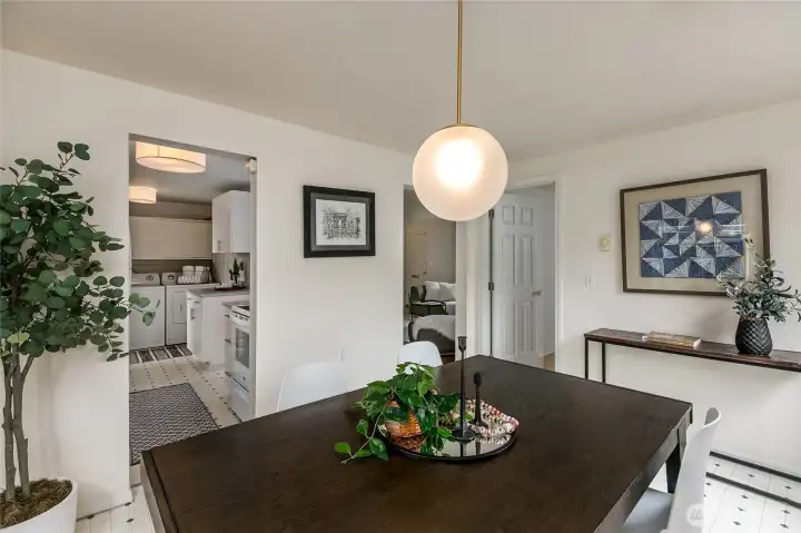 This angle shows the relationship of the dining area to the kitchen and to the main living area....  The other door is to a third bedroom/office.
