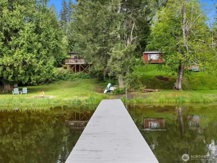 The large dock is ready for water play and fishing.