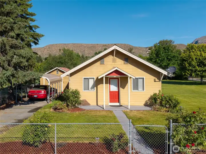 Front view, driveway, carport
