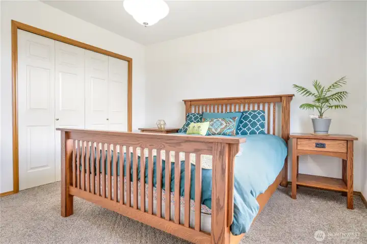 One of three large bedrooms upstairs One of three large bedrooms upstairs