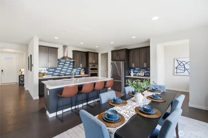 Whether you're entertaining friends or helping with homework, everyone naturally gathers here.