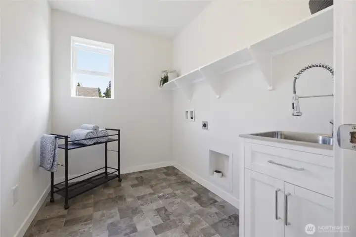 Convenient upstairs laundry keeps everyday routines simple.